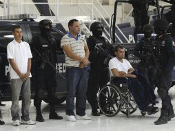 Uno de los detenidos está en silla de ruedas tras recibir disparos en las piernas. ESPECIAL  /