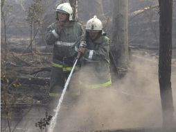 Bomberos logran detener un incendio cerca de la provincia de Plotava (Este de Moscú). AP  /