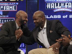 Jerry Rice (izq.) y Smith serán parte de un grupo de siete hombres que serán introducidos al Salón de la Fama. AP  /