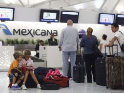 Aspecto de las taquillas de Mexicana de Aviación en el Aeropuerto Internacional de la Ciudad de México. AP  /
