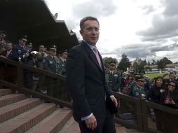 El saliente ejecutivo de Colombia deja su mandato con tareas pendientes y aciertos en la principal lucha de su Gobierno. AFP  /