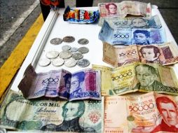 El sistema permite a las empresas comprar con bolívares bonos denominados en dólares. ESPECIAL  /