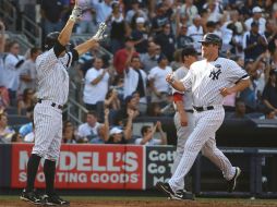 Lance Berkman anota durante la segunda entrada contra Boston. AFP  /