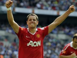 Javier Hernández festejando su primer gol con el Manchester United. AP  /
