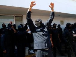 Policías federales realizaron el sábado una protesta contra un inspector, a quien señalaron de presuntos nexos con el narcotráfico. AP  /