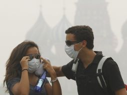 La ola de calor causó diversos incencios que ahora hacen estragos en la capital. EFE  /