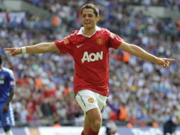 Foto de acción de Javier 'Chicharito' Hernández festejando su gol. AP  /