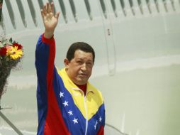 El presidente Hugo Chávez arribó después de las 13:00 horas. EFE  /
