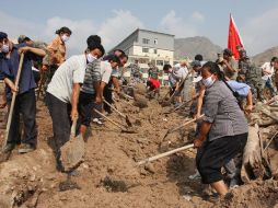 En la zona de Gansu, el aluvión de lodo y piedras arrasó todos los  inmuebles de por lo menos tres aldeas de esta región. EFE  /