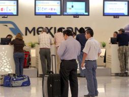 Los manifestantes el conflicto actual de la compañía. NTX  /