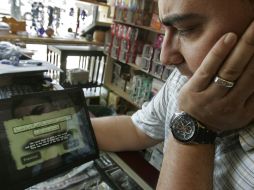 El periódico digital para plataformas móviles incluiría contenido breve y fácil de leer para una audiencia general. AP  /