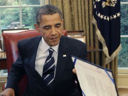 Obama promulga la nueva ley fronteriza. Analistas de Estados Unidos interpretan que es el primer paso hacia una reforma migratoria. AP  /