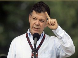 Juan Manuel Santos, pedirá el pago de 800 MDD que Venezuela le debe a los exportadores colombianos. AP  /