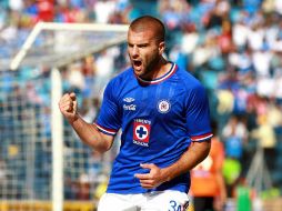 Emanuel Villa festeja el segundo gol de los Cementeros en el partido ante los Tuzos. MEXSPORT  /