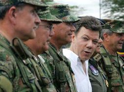 Siendo ministro de Defensa colombiano, Juan Manuel Santos logró replegar a la guerrilla. Como presidente continuará la lucha. AP  /