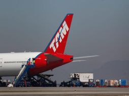 TAM y LAN continuarán volando bajo las mismas banderas con las que actúan ahora. REUTERS  /