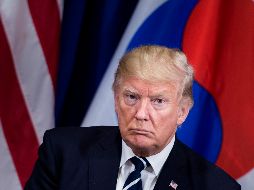 US President Donald Trump waits for a meeting with South Korea