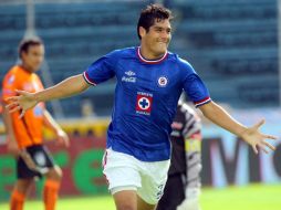 Javier 'Chuletita' Orozco celebra sus goles anotados ante el Pachuca. NOTIMEX  /