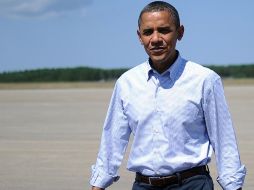 Barack Obama llega a Martha's Vineyard para unas vacaciones en las que buscará recuperar fuerzas antes de los comicios de noviembre.AFP  /