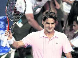 Roger Federer celebra su victoria ante el chipriota Marcos Baghdatis. REUTERS  /