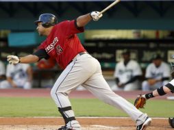 Foto de acción de Carlos Lee en el duelo ante los Astros de Houston. AP  /