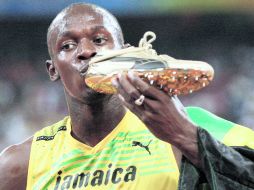 El 'Rayo' Bolt tiene una relación de trabajo con Puma desde que él tenía 16 años. AP  /