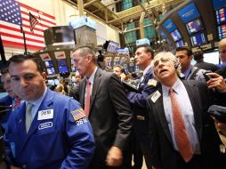 El valor del Dow Jones de Nueva York ya está por debajo de los 10 mil puntos. AP  /