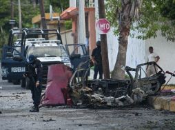 La explosión sólo causó daños materiales a los edificios de la zona. AFP  /