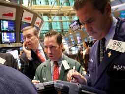 Cinco acciones subían por cada una que bajaba y el volumen ascendía a 410 millones de acciones. AP  /