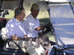 Barack Obama y Michael Bloomberg van a jugar golf, mientras el madatario vacaciona. AP  /