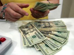 Será a  partir del 11 de septiembre del año en curso cuando dejen de aceptarse los dólares para pagos. ARCHIVO  /