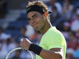 Nadal festeja su triunfo ante Simon. AP  /