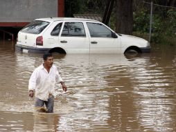 Las intensas lluvias provocaron diversas inundaciones y deslaves de cerros. NTX  /