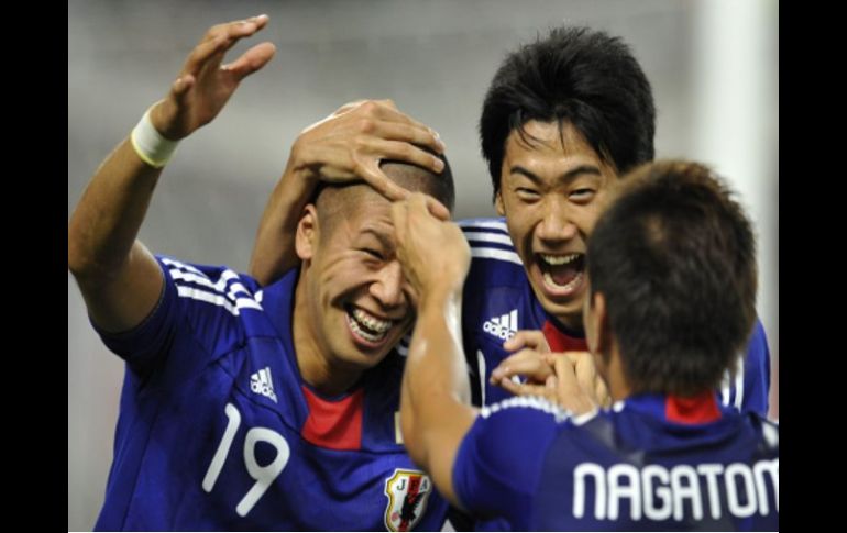 Los jugadores de la Selección de Japón festejando su victoria. AFP  /