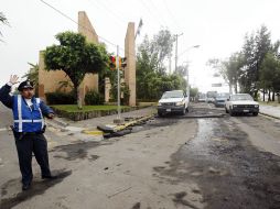 A consecuencia de la lluvia de ayer también hubo afectaciones en el pavimento de la ciudad. A. GARCÍA  /