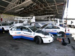 Las patrullas de la Policía de Guadalajara están más tiempo en el taller que en las calles. E. PACHECO  /