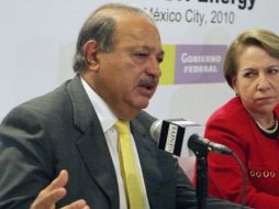 Carlos Slim podría hacerse del 16% de las acciones de la empresa editorial. AP  /