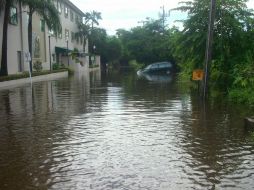 Aspecto de una vialidad en Puerto Vallarta inundada por las lluvias de la temporada. M. INFANTE  /