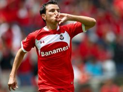 Foto en accion de Mario Mendez de Toluca festejando la anotación de un gol. MEXSPORT  /