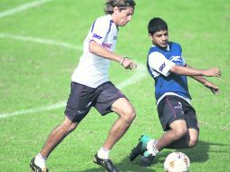 Enrique Vera (izq.) se reportó ayer al entrenamiento del Atlas. JAMMEDIA  /