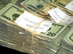 Se prohibirá recibir de personas físicas dólares en efectivo para realizar operaciones individuales en casas de bolsa. EL UNIVERSAL  /