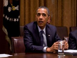 Obama intenta convencer al electorado que puede elegir entre volver a la política republicana o respaldar las suyas. EFE  /