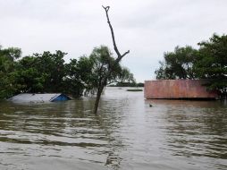 Techos de casas sumergidas tras las inundaciones de esta semana en Tlacotalpan, Veracruz. REUTERS  /