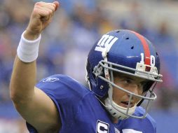 Eli Manning el mariscal de campo de los Gigantes, celebra el triunfo de su equipo.REUTERS  /