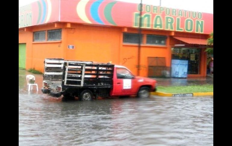 Los efectos de las lluvias causadas por la tormenta 'Karl' ya se dejan sentir en Quintana Roo. EL UNIVERSAL  /