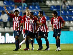 Los jugadores de las Chivas quieren realizar su segunda victoria en su nueva casa. JAMMEDIA  /