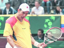 Santiago Giraldo arrolló a Sam Querrey para obtener el punto del empate para Colombia. AP  /
