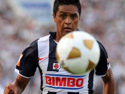 Sergio Santana lesionado en el juego contra Atlas. MEXSPORT  /