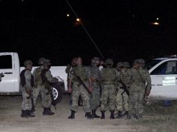 Elementos del Ejército resguardaron la escena del criman donde perdió la vida Prisciliano Rodríguez. AP  /