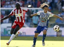 Andrés Guardado durante en partido ante el Almería donde no pudo hacer ninguna anotación para el Deportivo. EFE  /